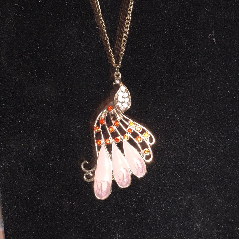Peacock with pink feathers and red stone inlay